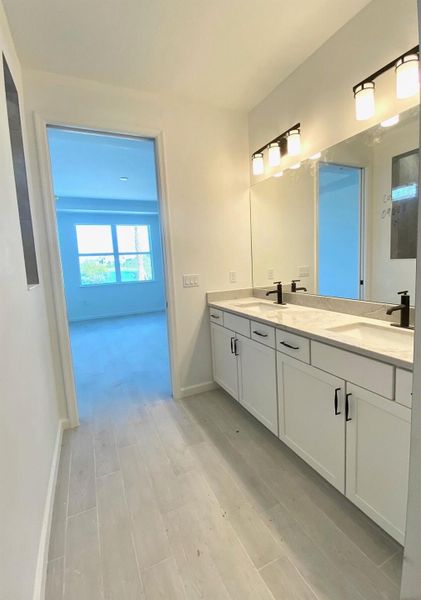 Furnished interior view inside a new home in Costa Pointe, Vero Beach (Image 18).