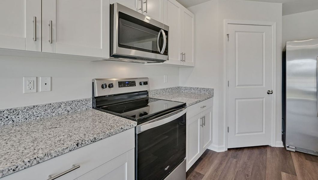 Representative furnished interior of a home built from the HAYDEN by D.R. Horton in Cedar Hill Landing, Navassa (Image 7).