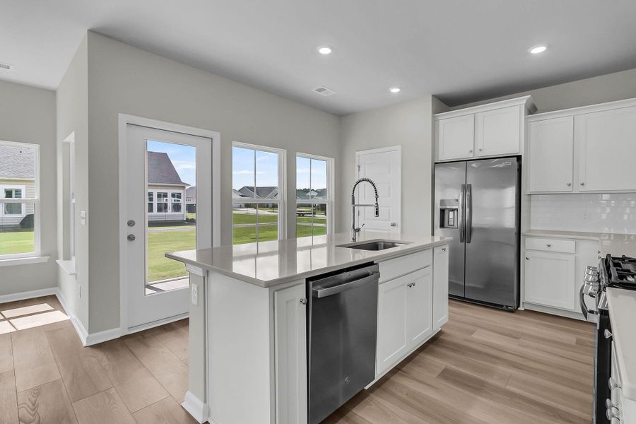 Furnished interior view inside a new home in Horizons at Summers Corner | 55+: The Cottages, Summerville (Image 7). Furnished interior view inside a new home in Horizons at Summers Corner | 55+: The Cottages, Summerville (Image 7).