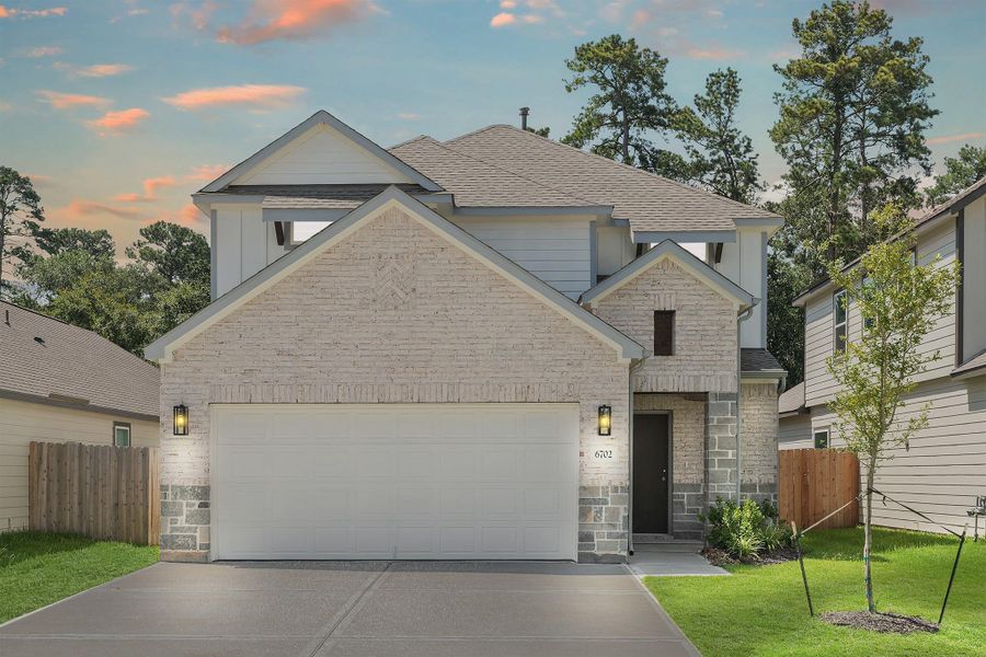 Front exterior of a new home in Cypresswood Landing, Humble, TX, highlighting curb appeal (Image 23).
