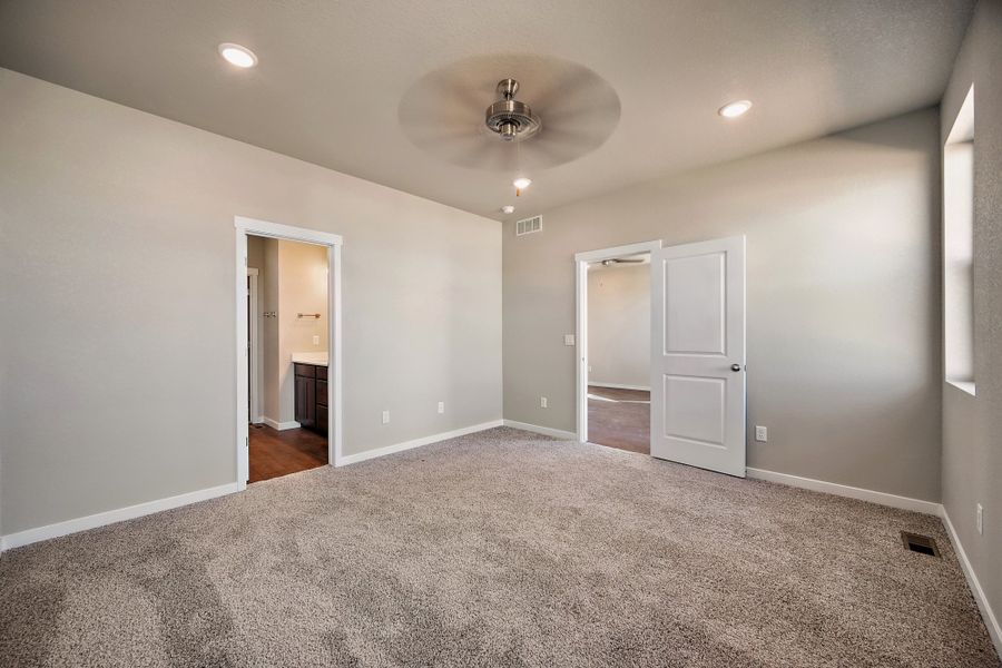 Spacious, unfurnished interior of a new home in Ridge at Lorson Ranch, Colorado Springs (Image 24).