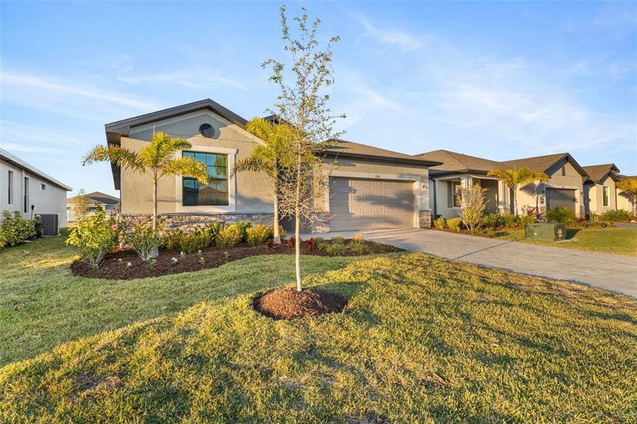 Front exterior of a new home in , Port Charlotte, FL, highlighting curb appeal (Image 21).