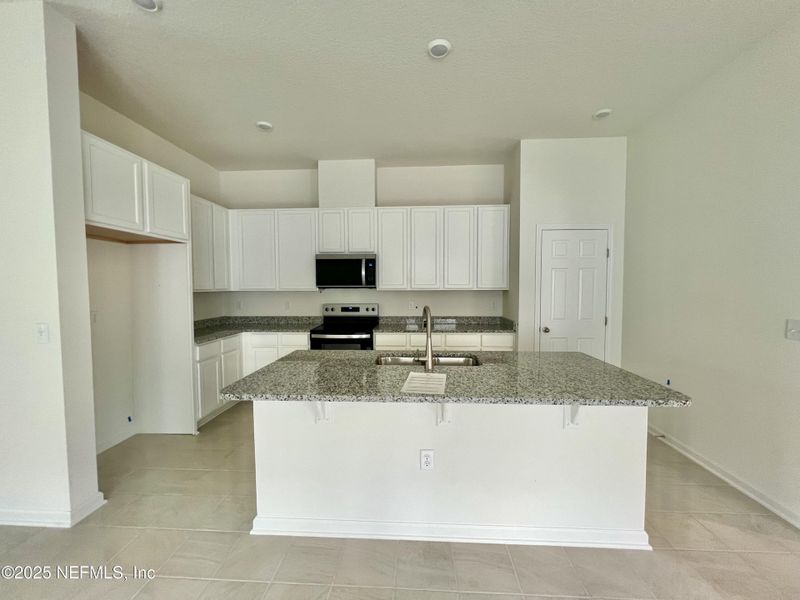 Furnished interior view inside a new home in Panther Creek, Jacksonville (Image 3).