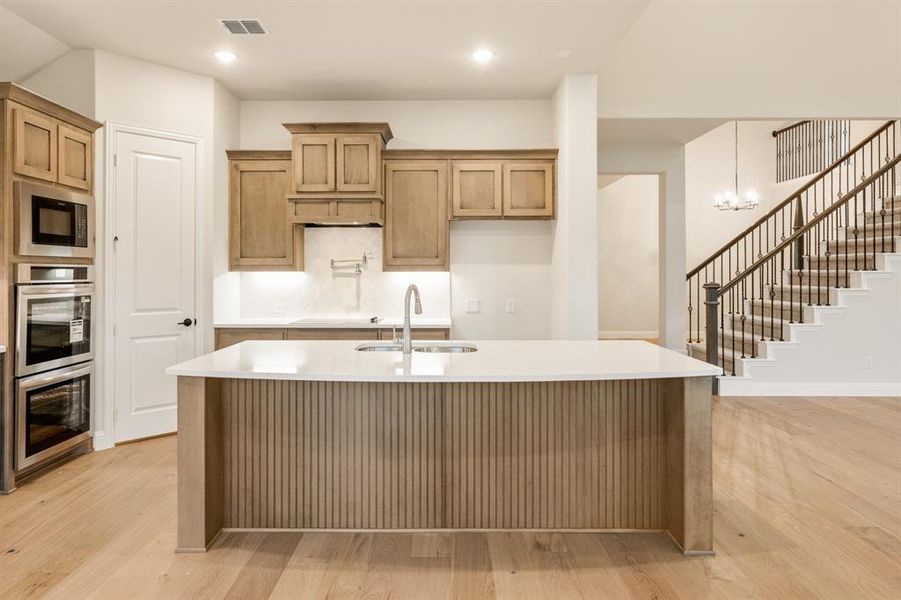 Furnished interior view inside a new home in Sunrise at Garden Valley 60-79, Waxahachie (Image 5).
