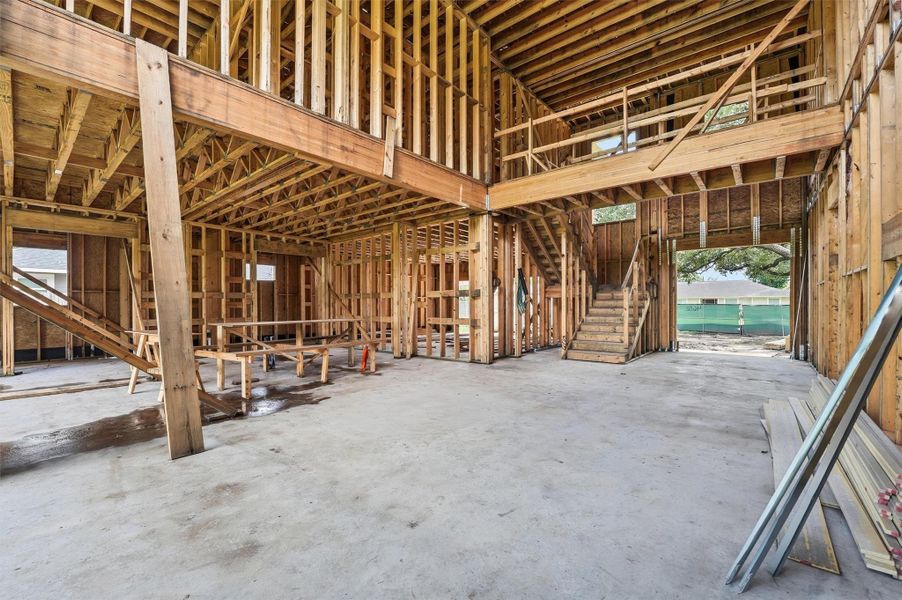 Great room with dramatic ceiling height and open layout Great room with dramatic ceiling height and open layout
