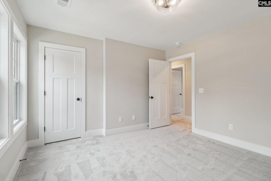 Spacious, unfurnished interior of a new home in Collins Cove, Chapin (Image 28). Spacious, unfurnished interior of a new home in Collins Cove, Chapin (Image 28).