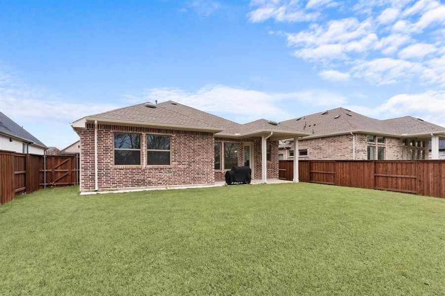 Exterior details and patio area of a home in , Van Alstyne (Image 25).