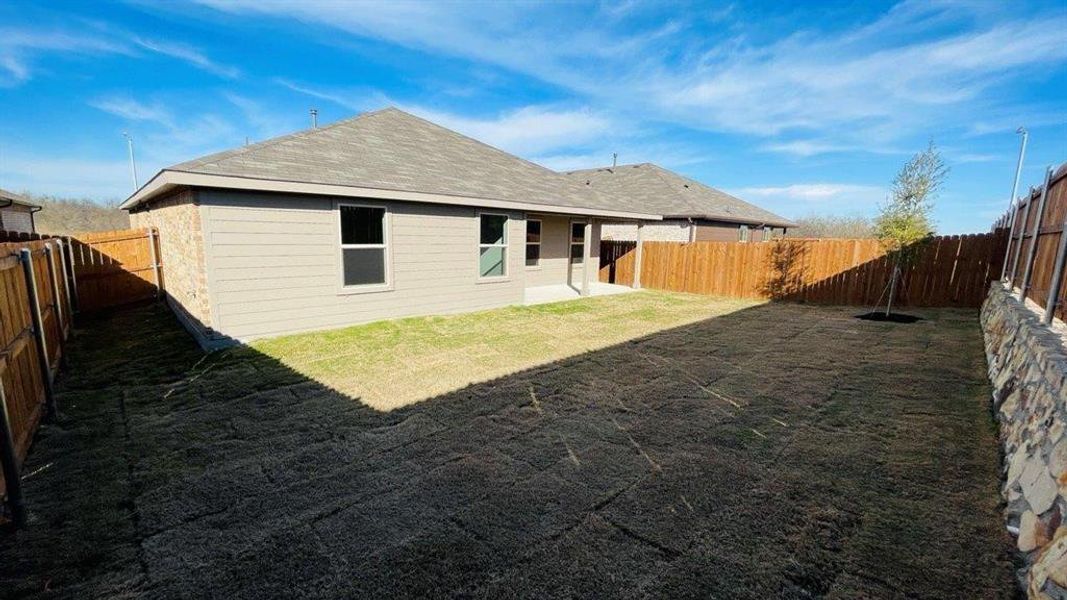 Exterior details and patio area of a home in Sunnycreek, Crowley (Image 15). Exterior details and patio area of a home in Sunnycreek, Crowley (Image 15).
