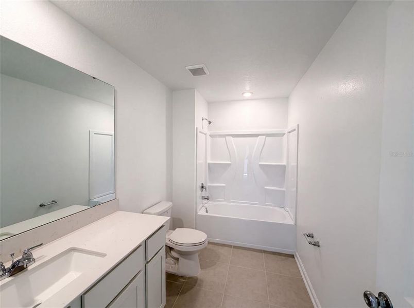 Furnished interior view inside a new home in Ranches at Lake Mcleod, Eagle Lake (Image 5).