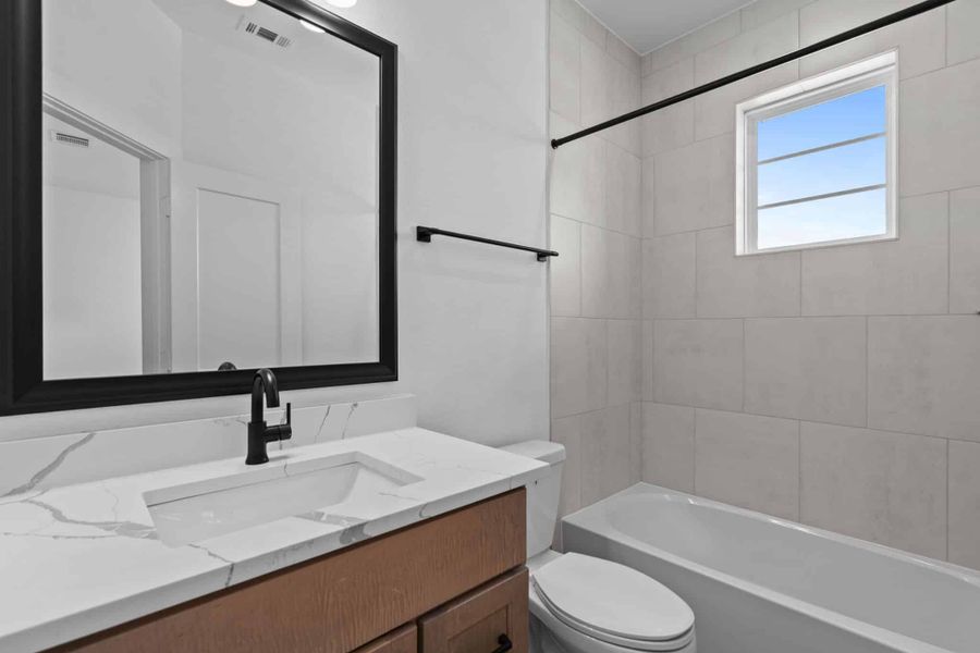 Furnished interior view inside a new home in Fulshear Lakes, Fulshear (Image 18). Furnished interior view inside a new home in Fulshear Lakes, Fulshear (Image 18).