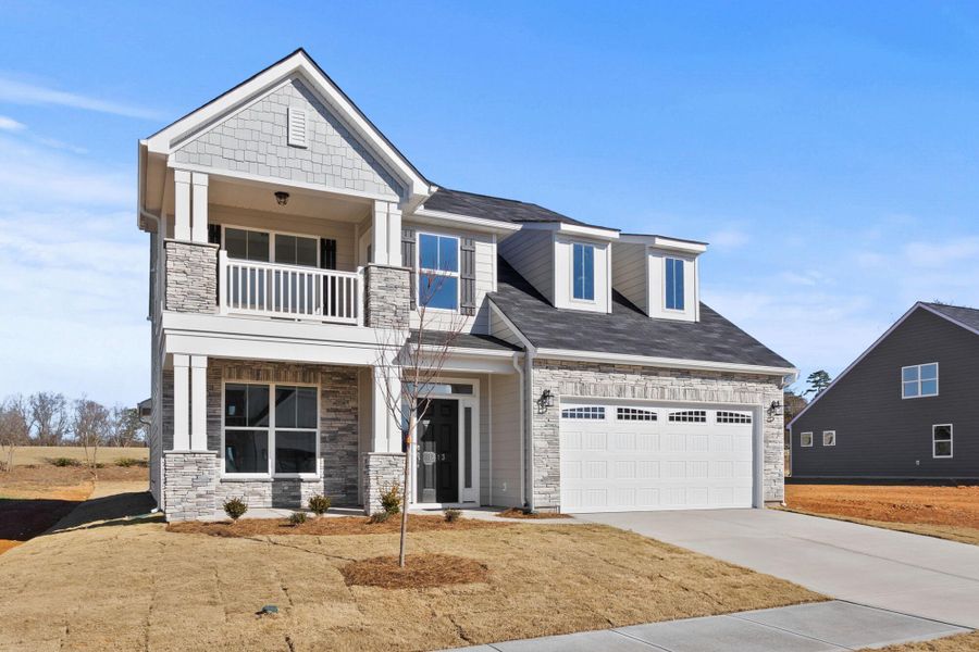Front exterior of a new home in Founders Club, Moore, SC, highlighting curb appeal (Image 2).