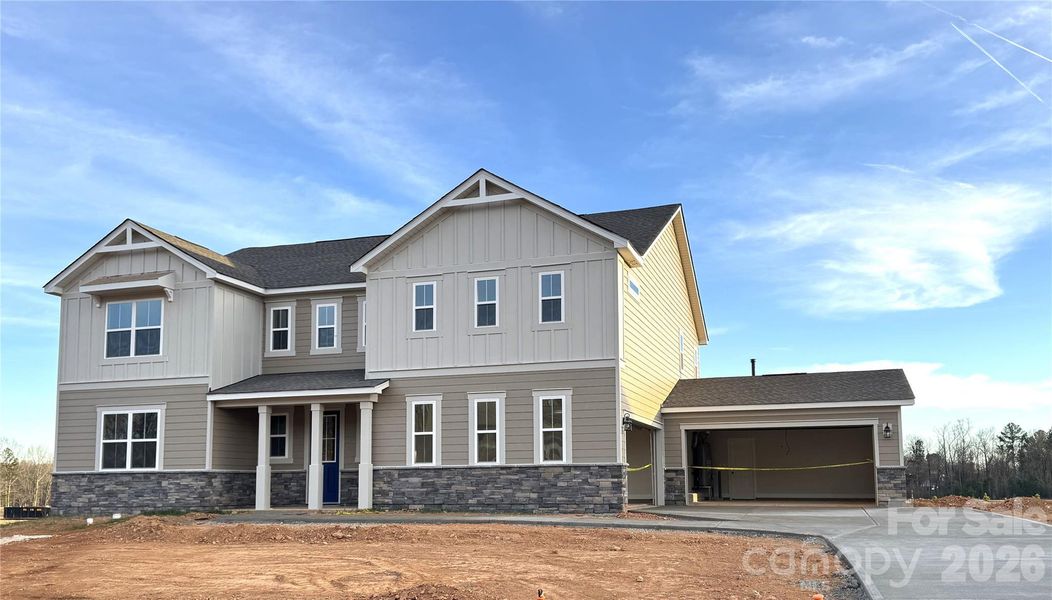 Front exterior of a new home in Blair Place, Monroe, NC, highlighting curb appeal (Image 2).