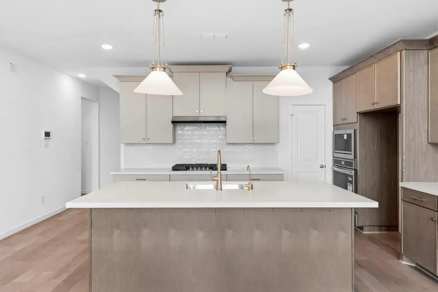 Stainless steel appliances and stylish finishes throughout