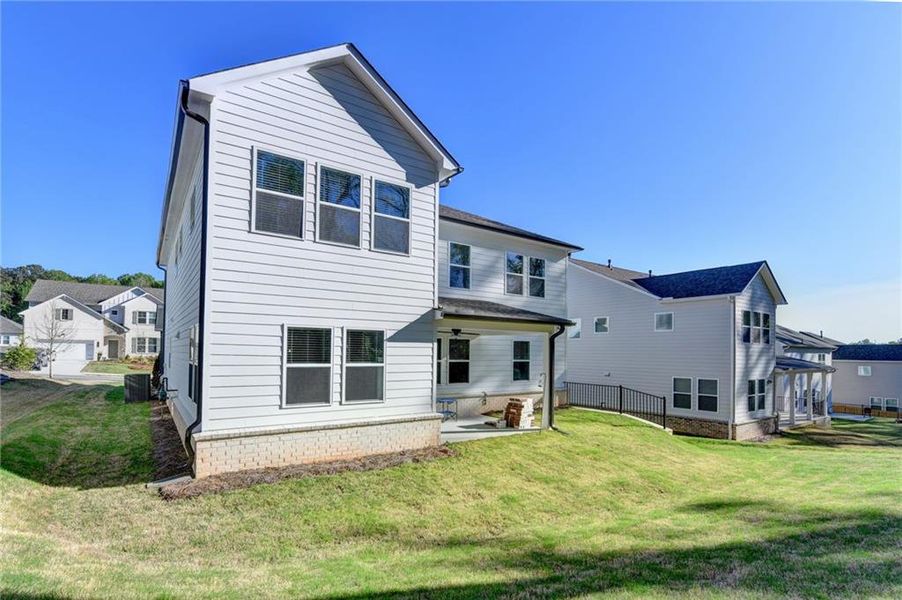 Exterior details and patio area of a home in Bailey Fence, Dacula (Image 31).