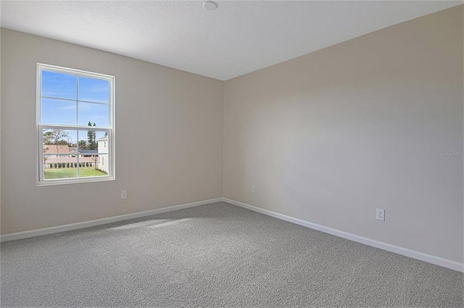 Spacious, unfurnished interior of a new home in Seasons at Summit Ridge, Apopka (Image 19).