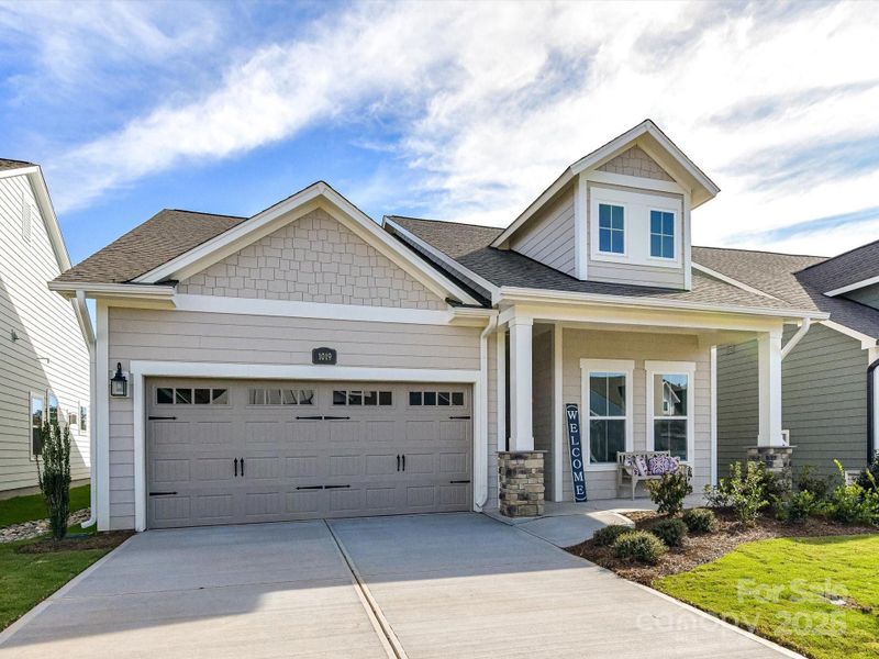 Front exterior of a new home in Encore at Streamside - Classic Series, Waxhaw, NC, highlighting curb appeal (Image 25).