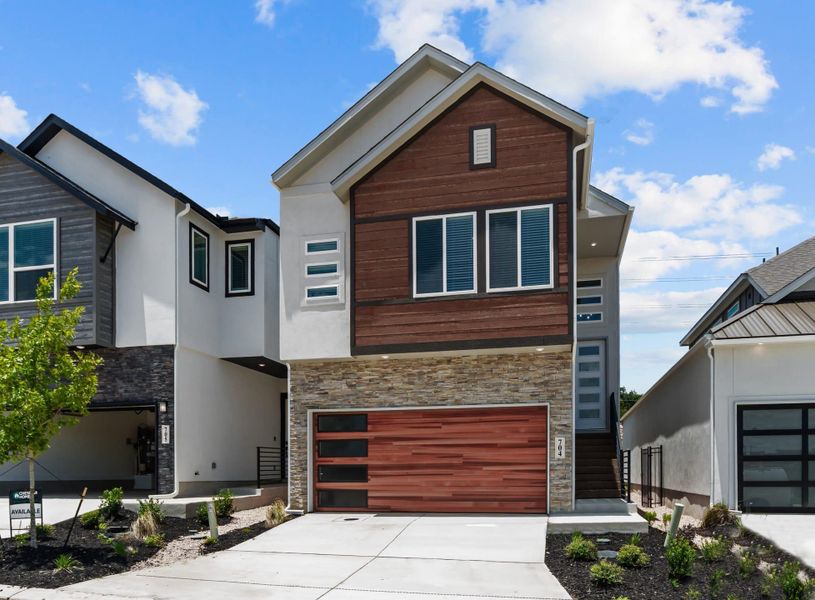 Front exterior of a new home in Centero at Stone Oak, San Antonio, TX, highlighting curb appeal (Image 18).