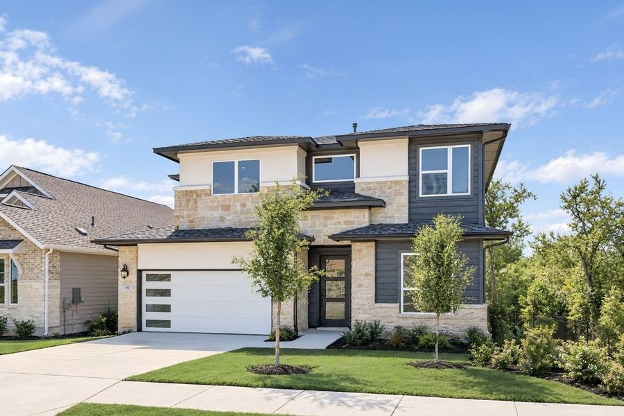 Front exterior of a new home in Silverleaf, Cedar Creek, TX, highlighting curb appeal (Image 2). Front exterior of a new home in Silverleaf, Cedar Creek, TX, highlighting curb appeal (Image 2).