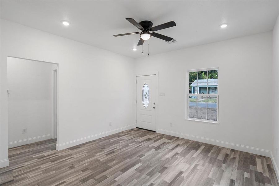Foyer featuring recessed lighting, light wood-type flooring, and a ceiling fan