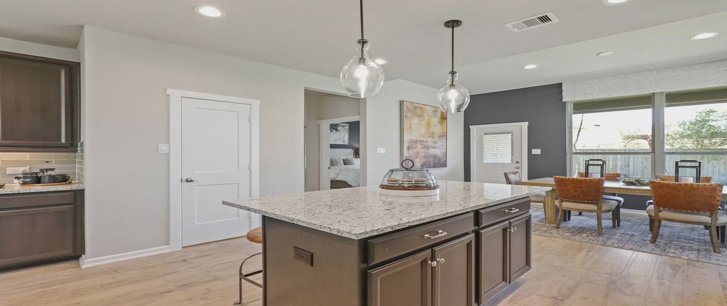 Representative furnished interior of a home built from the Durham by Chesmar Homes in The Woodlands Hills, Willis (Image 6).