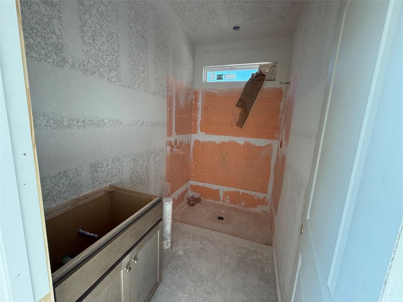 In-progress construction of a new home in The Cottages at La Cima, San Marcos, TX (Image 26).