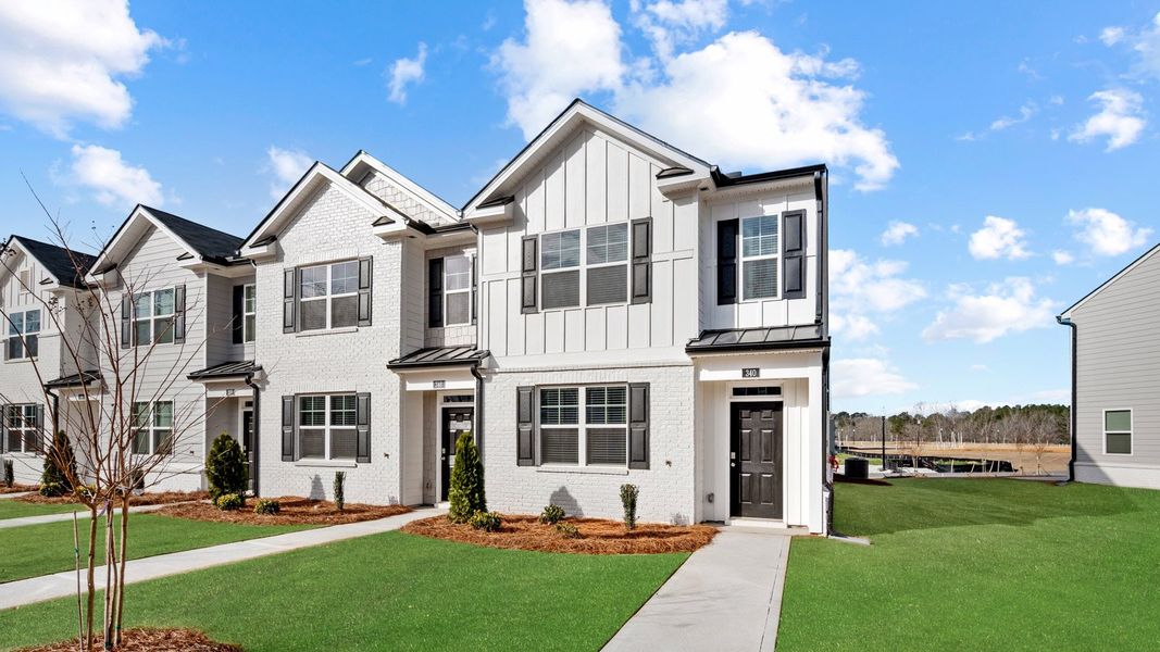 Front exterior of a new home in Echo Glen, Stockbridge, GA, highlighting curb appeal (Image 2).