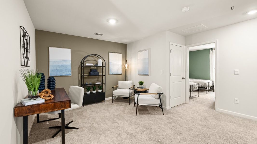 Representative furnished interior of a home built from the Sudbury 24' Townhome by D.R. Horton in Oconee Overlook Townhomes, Gainesville (Image 17).