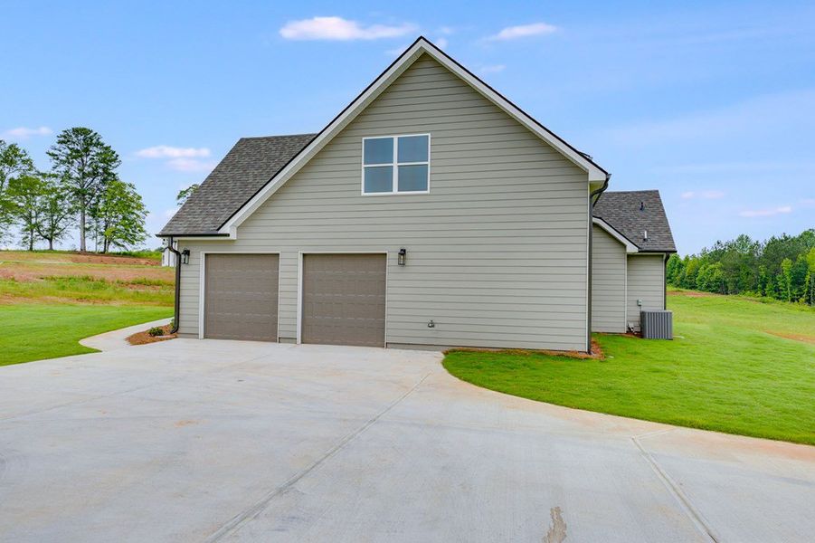 Exterior details and patio area of a home in Harmon Springs, Carrollton (Image 3).