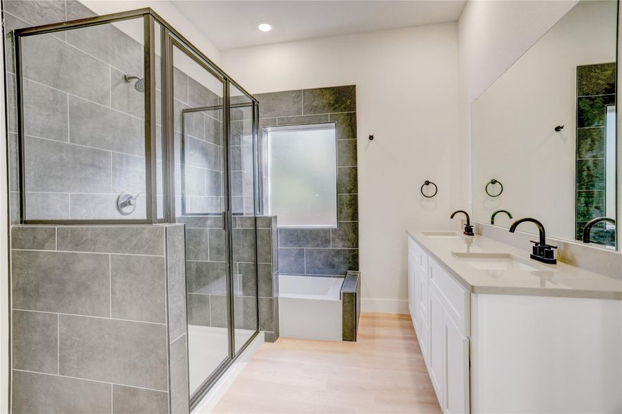 Primary bath includes walk in shower, soaking tub, and water closet.