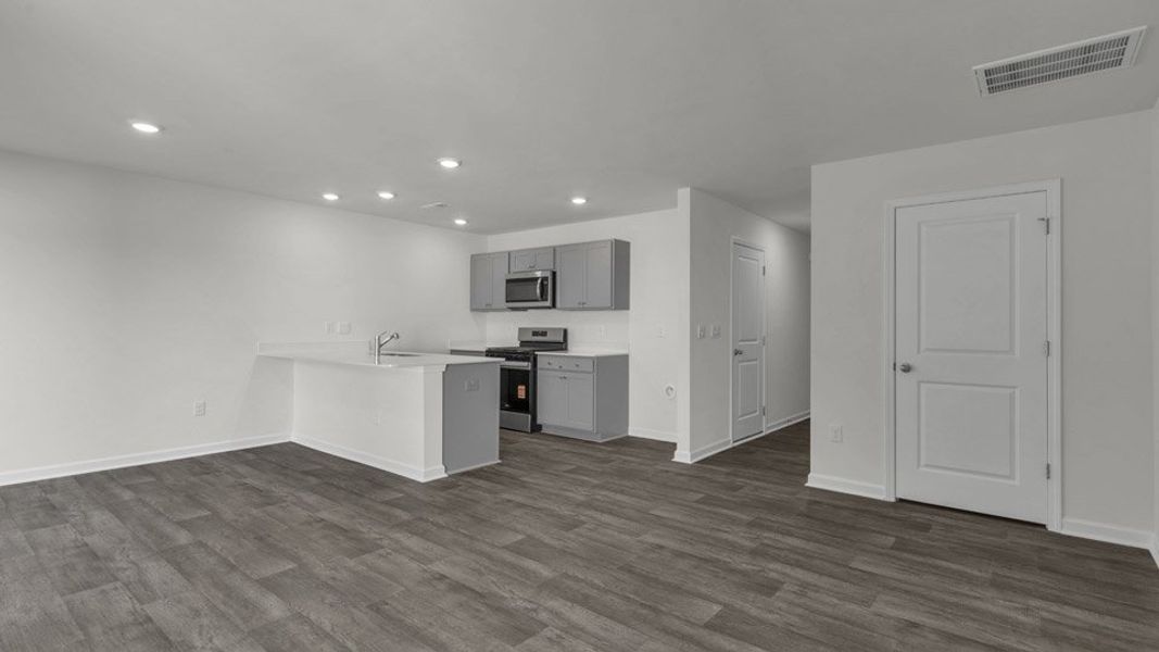 Spacious, unfurnished interior of a new home in The Townes at Honeycutt Oaks, Angier (Image 14).