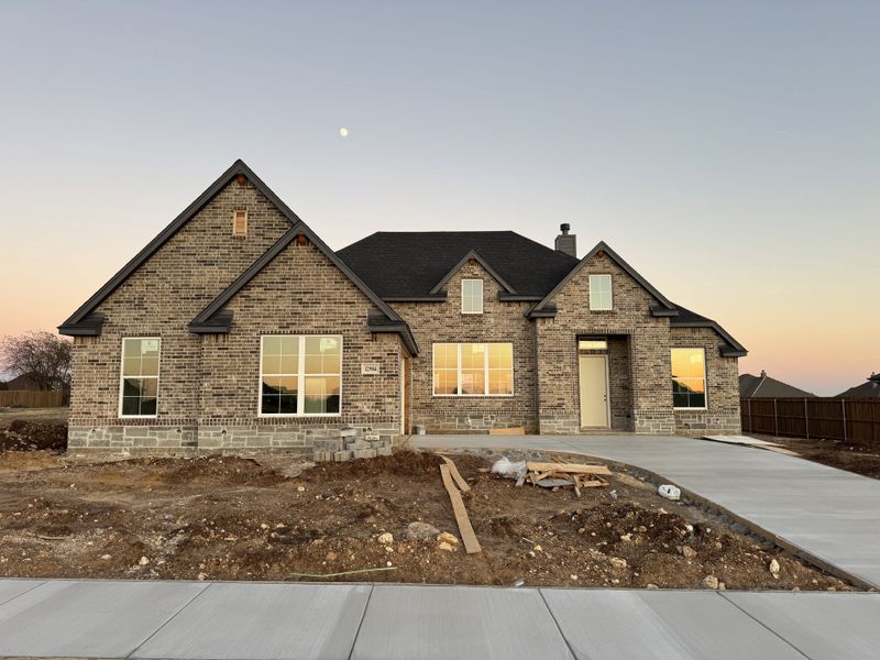 In-progress construction of a new home in Coyote Crossing, Godley, TX (Image 3).