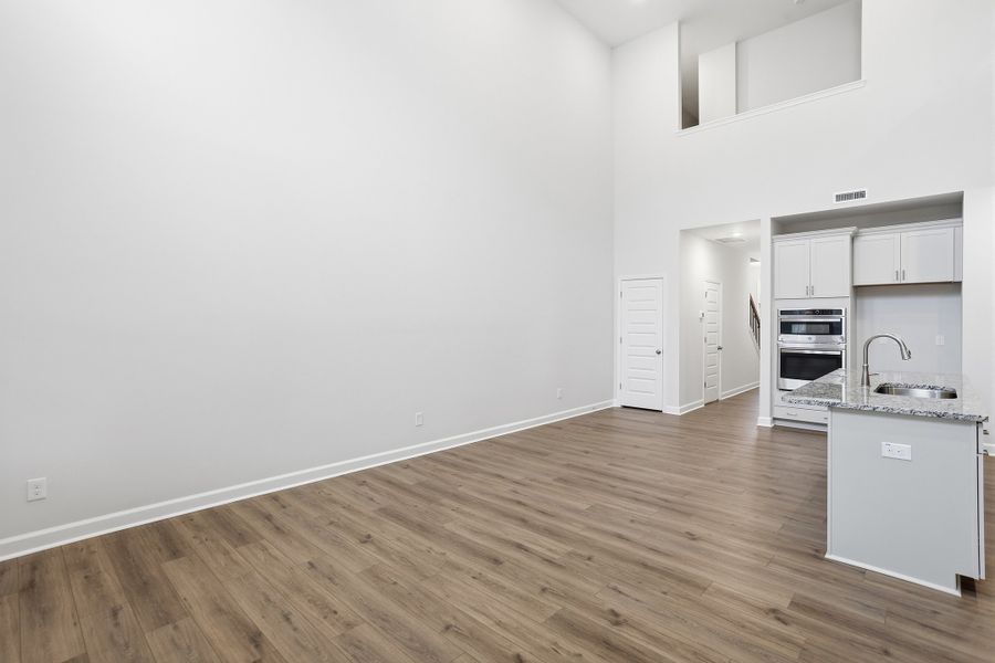 Spacious, unfurnished interior of a new home in Ovation at Sweetbrier, Durham (Image 17).