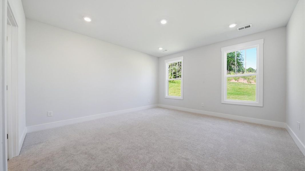 Desirable primary suite layout with spacious en suite bath in a proven, established community