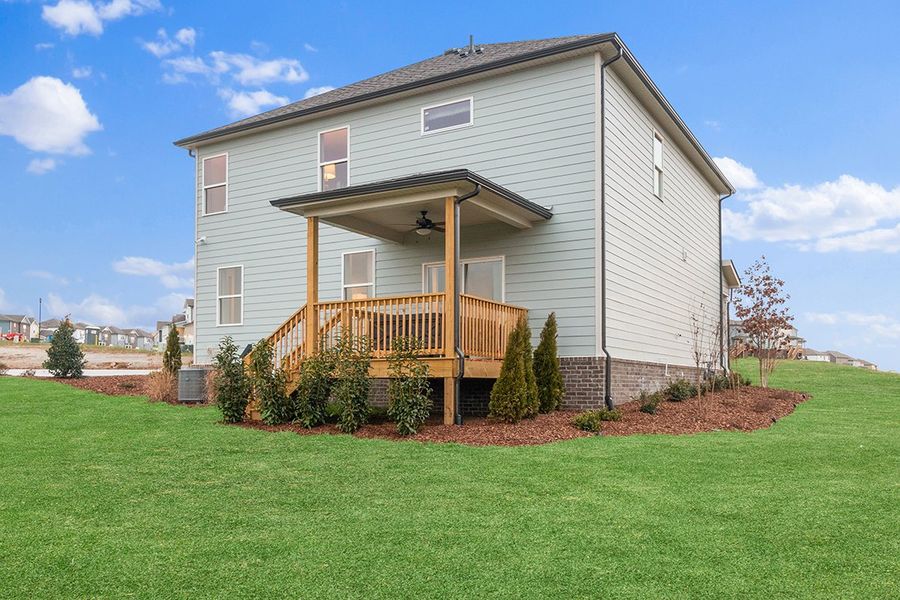 A house with a large front yard. A house with a large front yard.