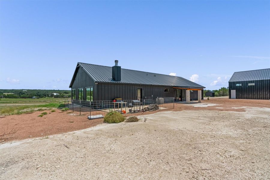 Front exterior of a new home in , Burnet, TX, highlighting curb appeal (Image 22). Front exterior of a new home in , Burnet, TX, highlighting curb appeal (Image 22).
