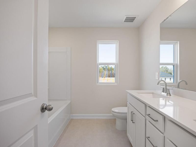 Furnished interior view inside a new home in Retreat at North Main, Lillington (Image 8).