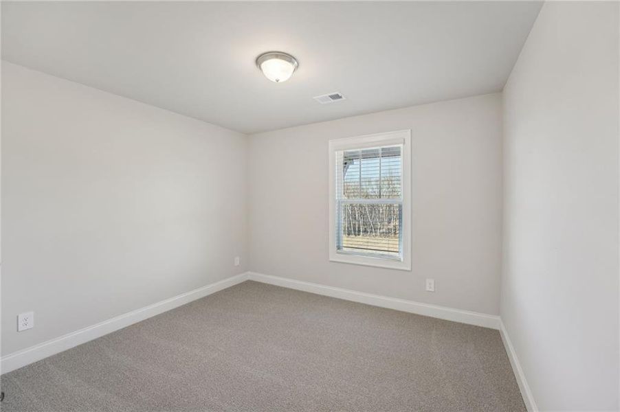 Spacious, unfurnished interior of a new home in Hemingway - Highland Series, Cumming (Image 44).