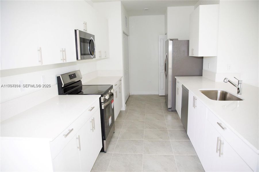 Furnished interior view inside a new home in , Dania Beach (Image 7). Furnished interior view inside a new home in , Dania Beach (Image 7).