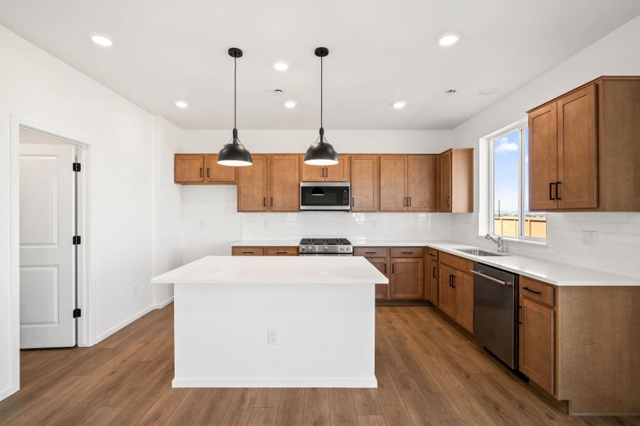 Furnished interior view inside a new home in Cordovan, Firestone (Image 7).