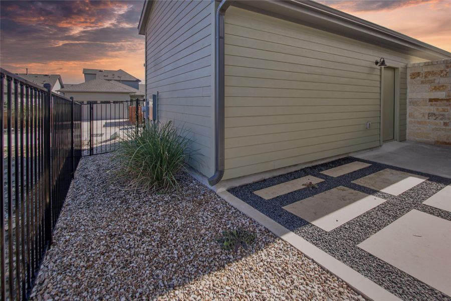 Side yard and detached garage