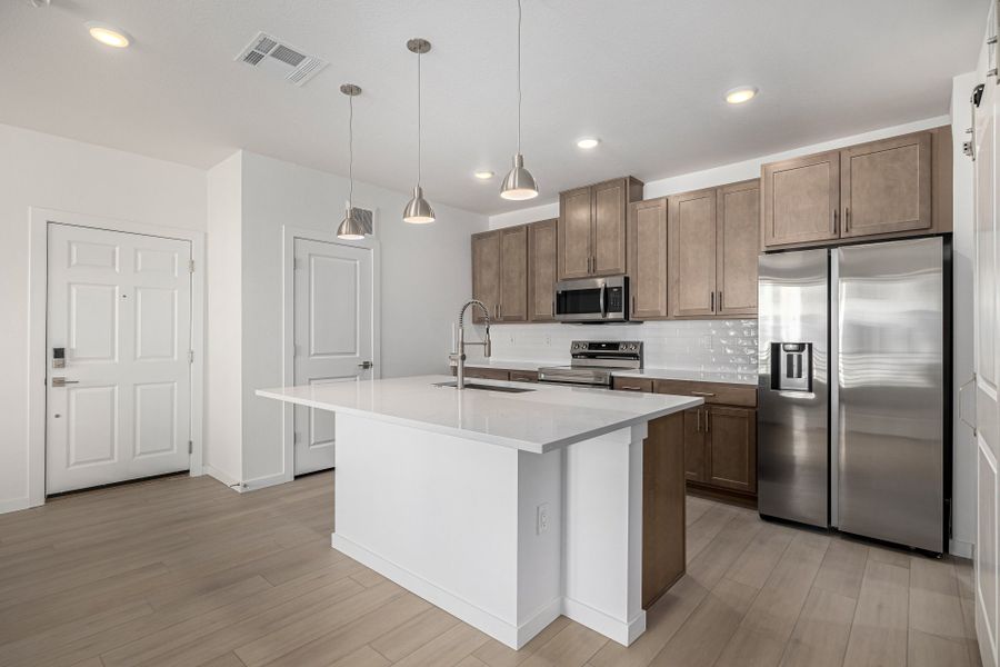 Furnished interior view inside a new home in The Residences at Victory Ridge, Colorado Springs (Image 4). Furnished interior view inside a new home in The Residences at Victory Ridge, Colorado Springs (Image 4).