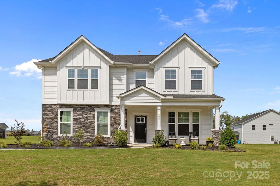 Front exterior of a new home in , Indian Trail, NC, highlighting curb appeal (Image 21).