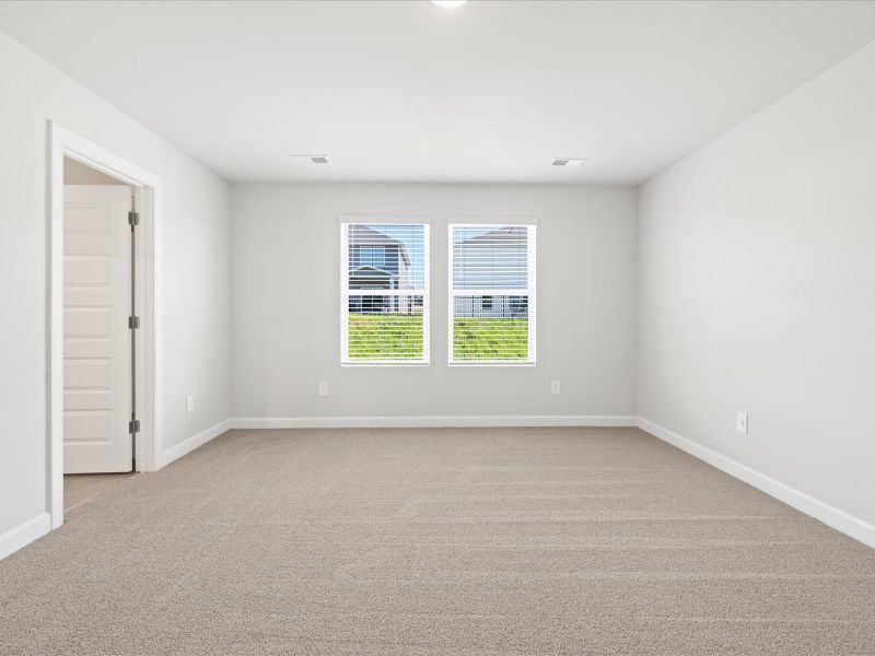 Spacious, unfurnished interior of a new home in The Farm at Wells Creek - Signature Collection, Gray Court (Image 13).