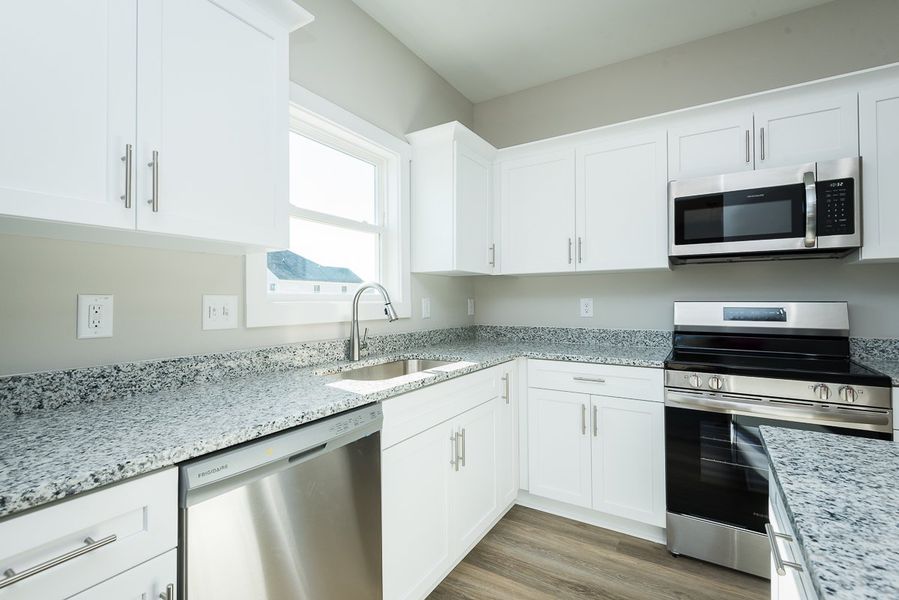 Representative furnished interior of a home built from the Harper by Foundation Home Builders LLC in Pallini Place, Ossipee (Image 6).