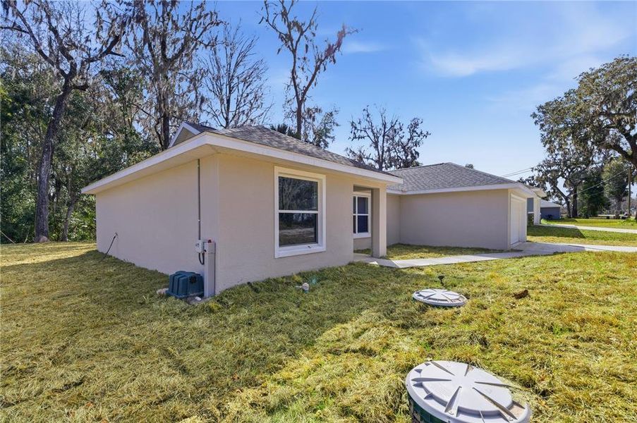 Exterior details and patio area of a home in , Summerfield (Image 14).