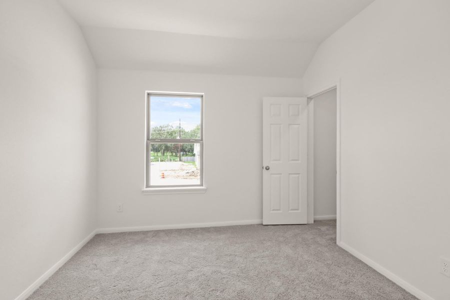 Your secondary bedroom features plush carpet, fresh paint, closet, and a large window that lets in plenty of natural lighting. Your secondary bedroom features plush carpet, fresh paint, closet, and a large window that lets in plenty of natural lighting.