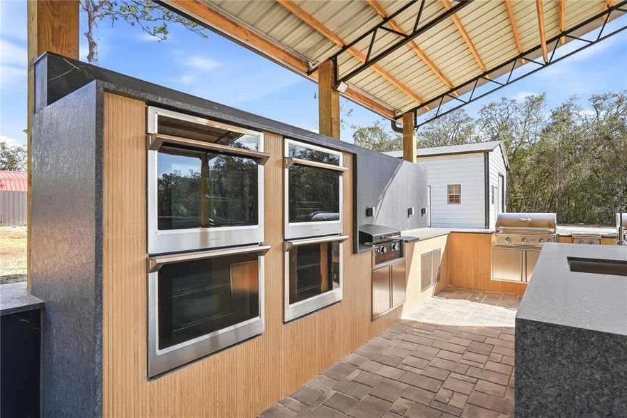 Exterior details and patio area of a home in , Spring Hill (Image 37).
