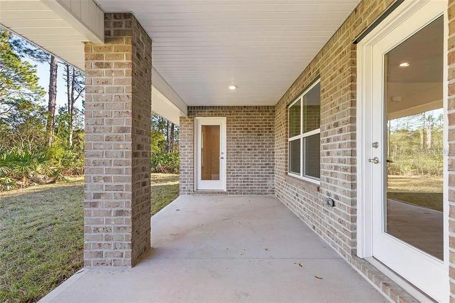 Exterior details and patio area of a home in Palm Coast, Palm Coast (Image 2). Exterior details and patio area of a home in Palm Coast, Palm Coast (Image 2).