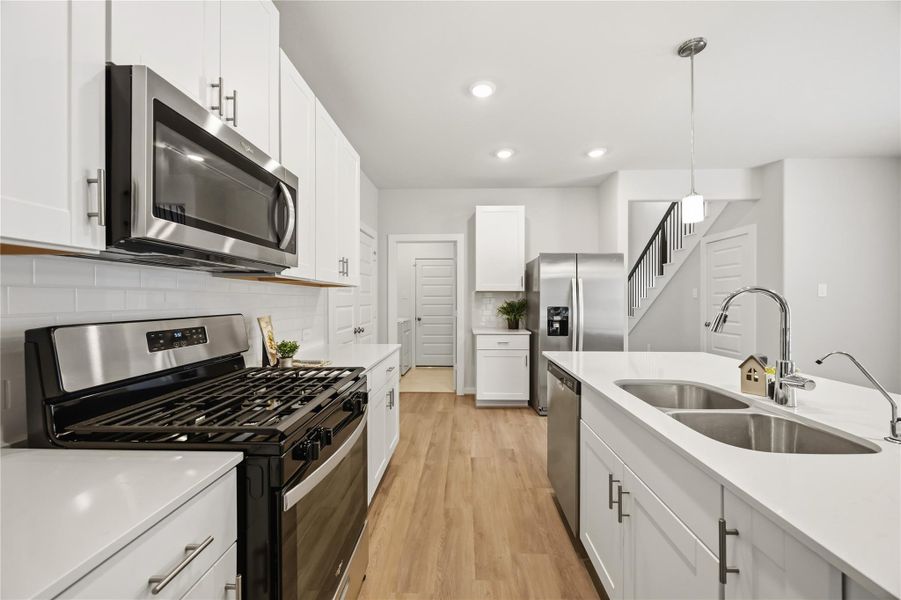 Gas stove and spacious kitchen. Gas stove and spacious kitchen.