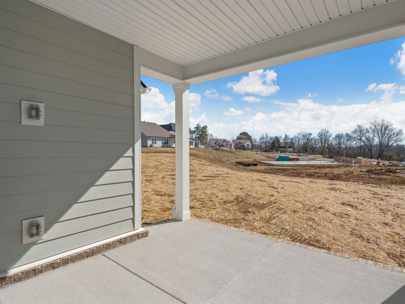 Exterior details and patio area of a home in Woods Crossing, Gallatin (Image 30).
